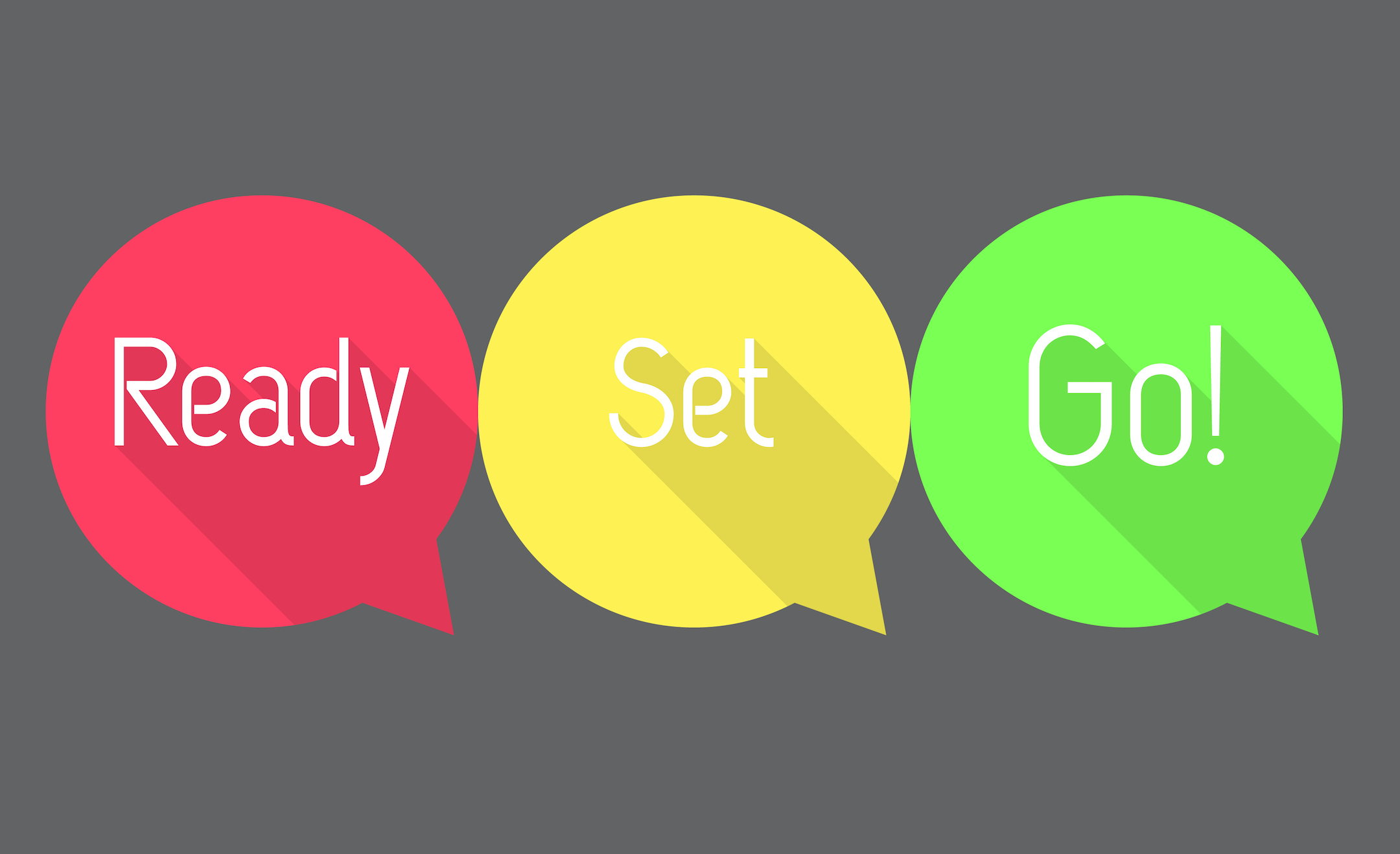 A set of three conversation bubbles in red, yellow, and green with the words, ready, set, go, showcasing that if you're asking what is sourcing, then it's something your company may need.